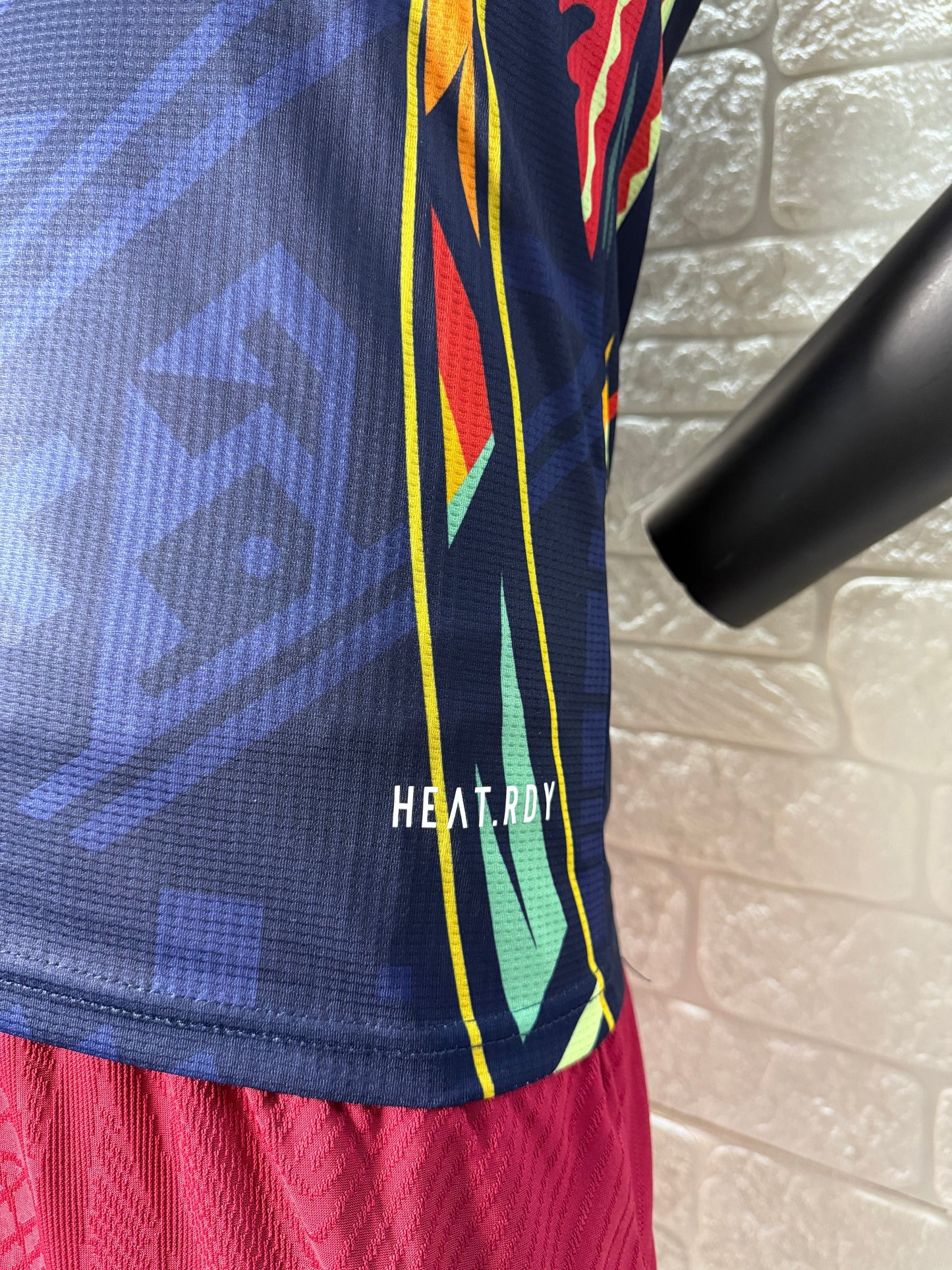 2025/26 Club América Training Player Version Jersey - Dark Navy Blue Body Multicolour Aztec Zigzag Graphic Upper Chest  - Gold Three Stripes - Club América Crest - Caliente Principal Sponsor