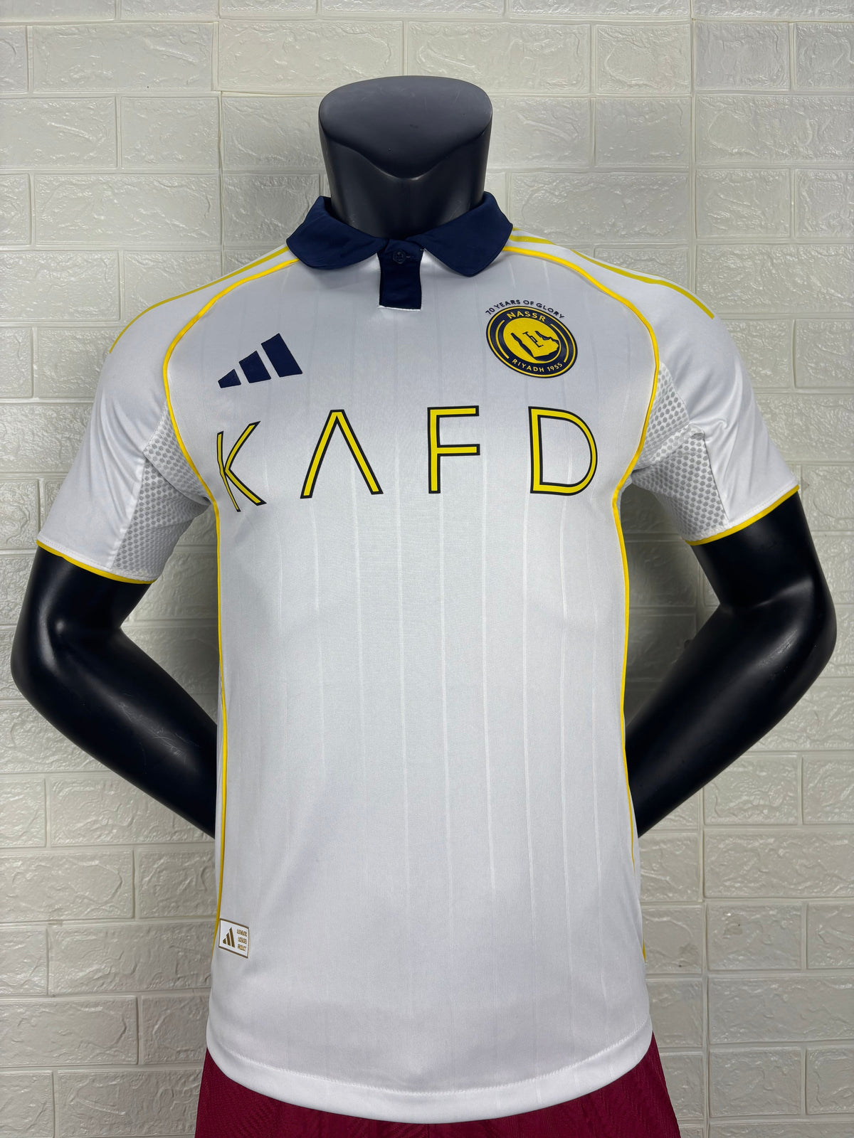 2025/26 Al-Nassr Away Player Version Jersey - White Body - Dark Navy Blue Polo Collar - Gold Yellow Side Seam Piping - KAFD Gold Yellow Sponsor